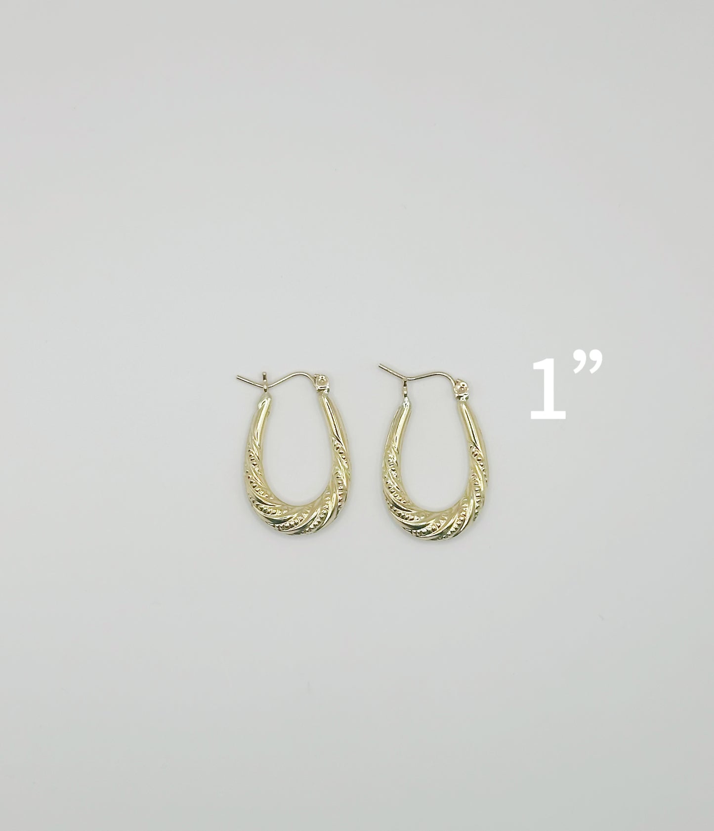 Argolla Ovalada Diseño Relieve Twist 10kt