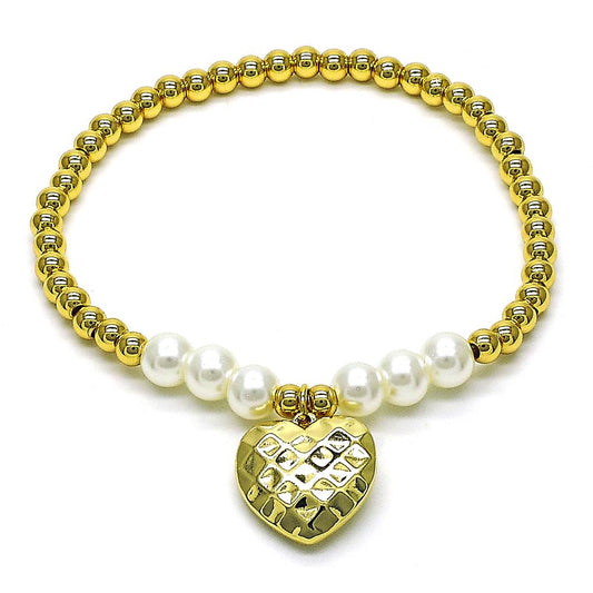 Golden bracelet with pearls and heart in laminated gold.